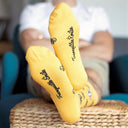 Chaussettes jaunes vélos portées - Les Vélos Tranquille Emile