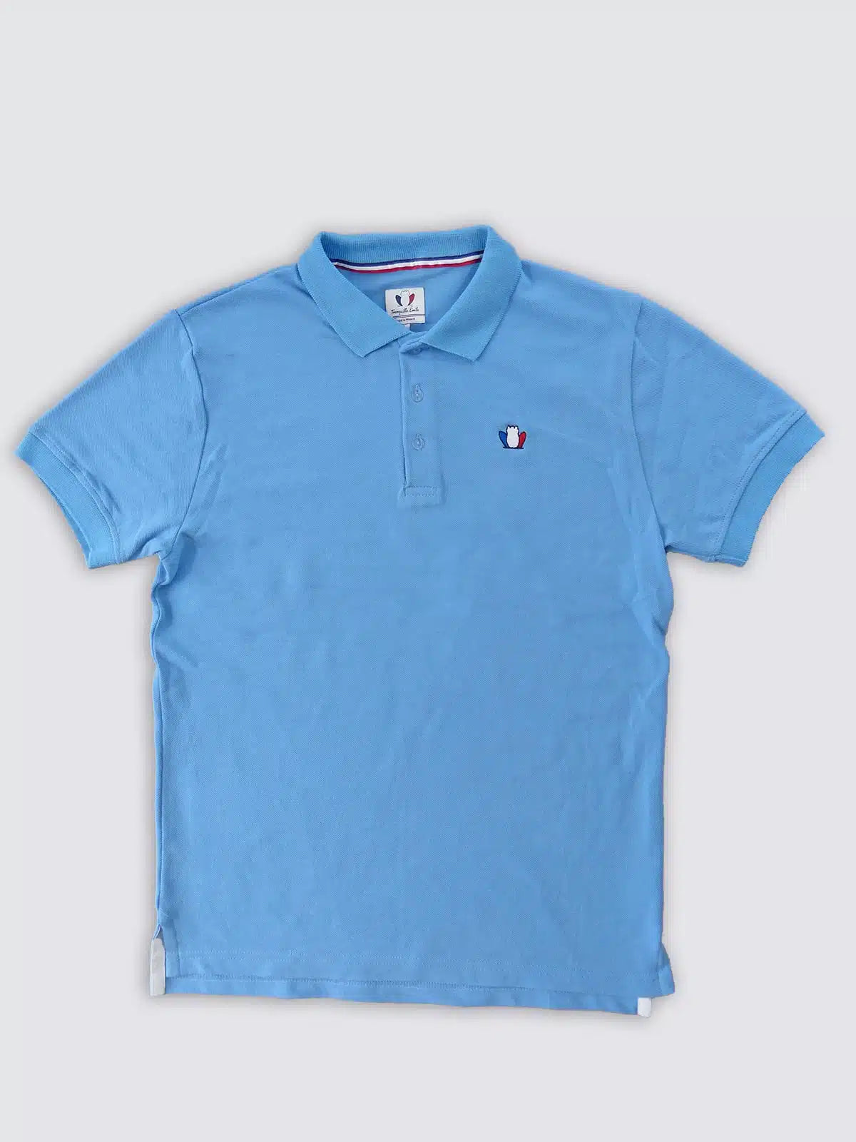 Polo homme bleu clair en coton piqué confectionné en France - L'Élégant vue de face