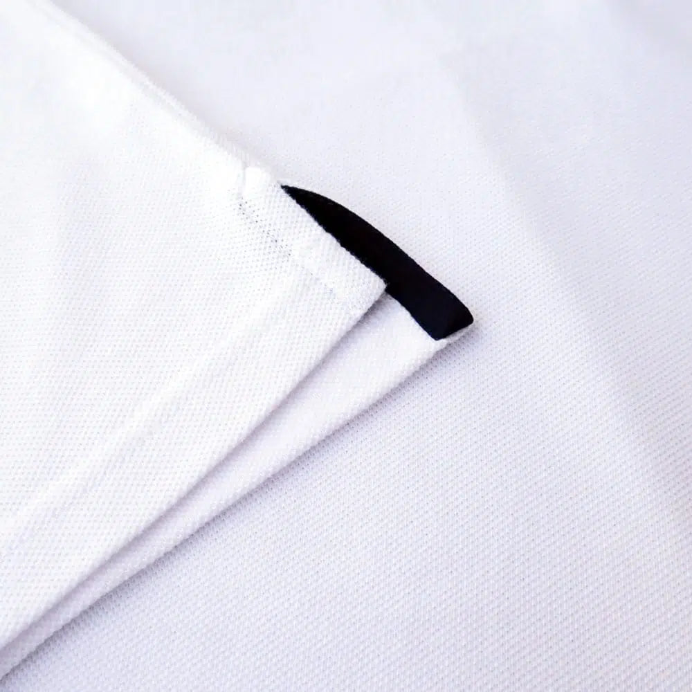 Polo femme blanc détail col - L'Élégant confection française