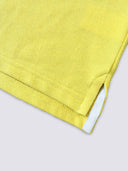 Polo homme jaune détail col - L'Élégant confection française
