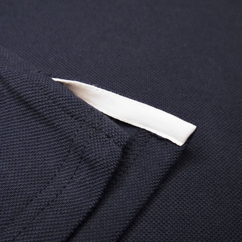 Polo femme bleu marine détail col - L'Élégant confection française